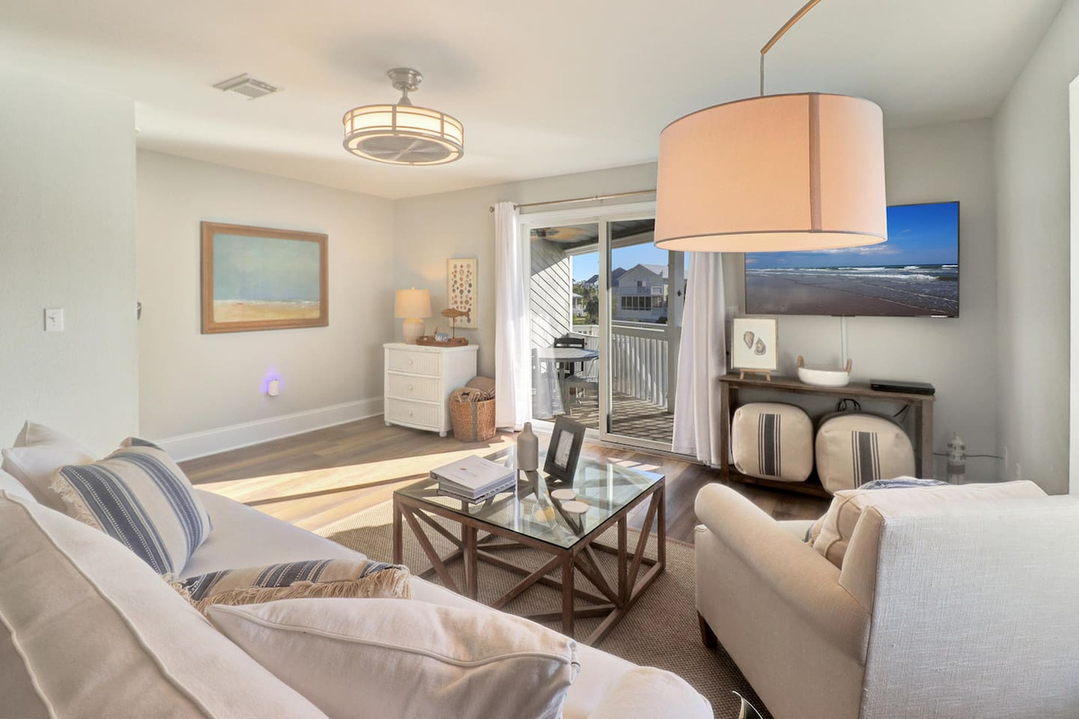 Your private deck holds both your morning coffee and your evening wine &mdash; Gulf views included.