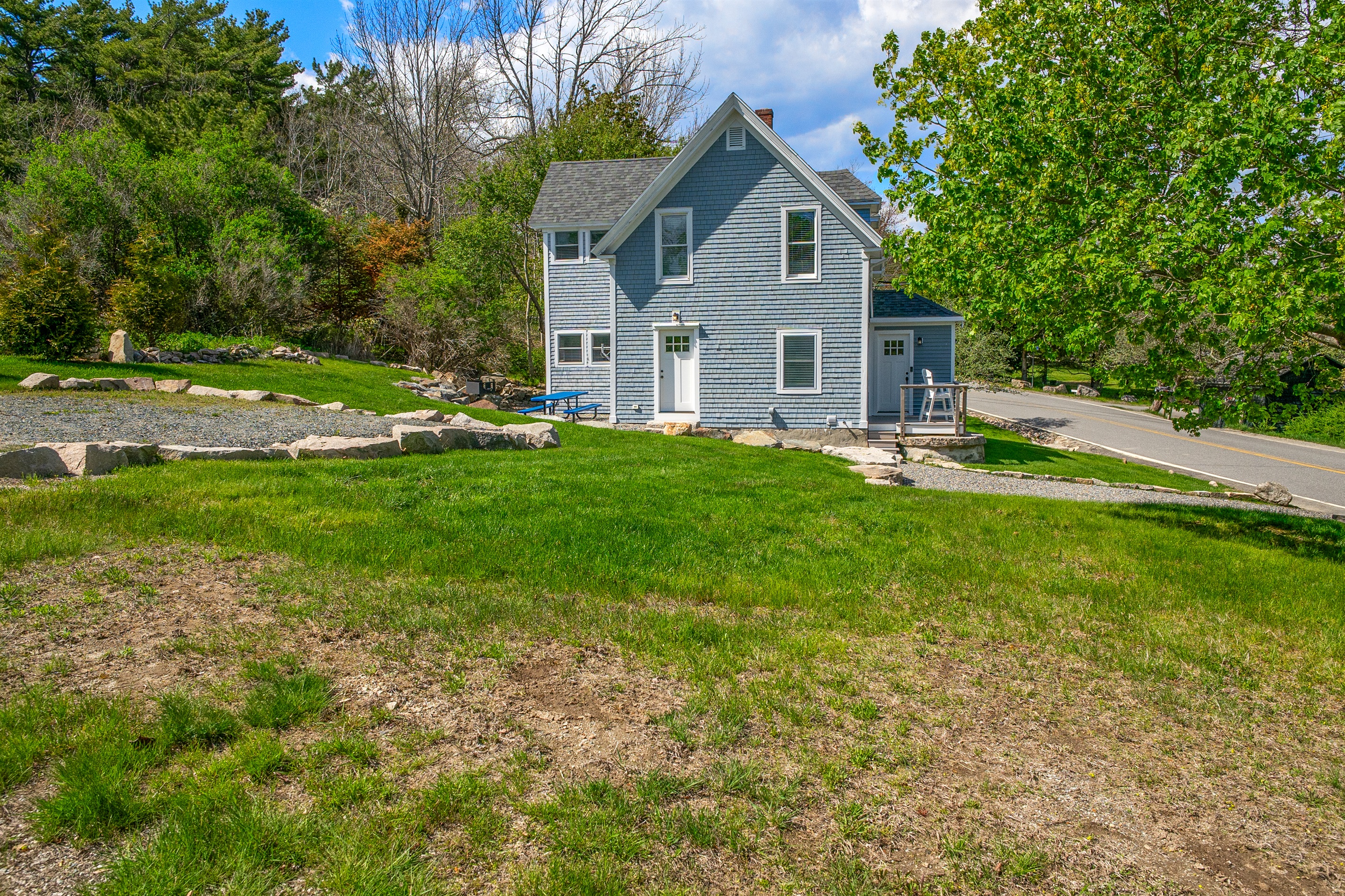 Expansive outdoor space in historic Hall Quarry. Our large, terraced lawn offers plenty of room for pets and kids to play on the MDI Quiet Side. A private corner lot with space to breathe, just minutes from Echo Lake and Acadia trails.