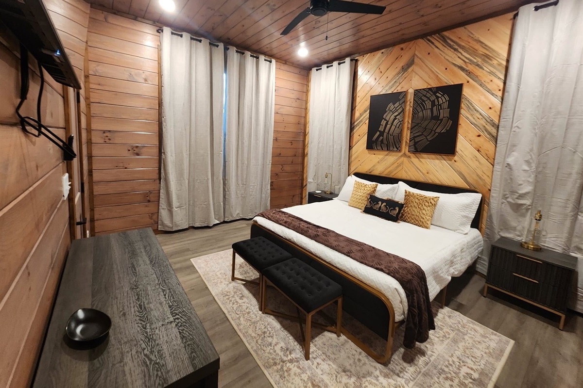 Rustic elegance with a king bed and inviting decor.