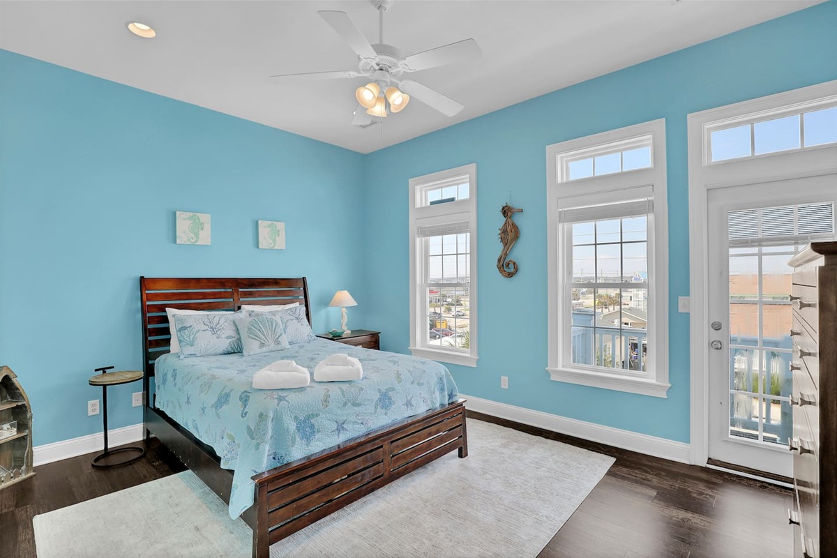 This bedroom is located on the top floor, just off of the main living area and includes an ensuite bathroom.