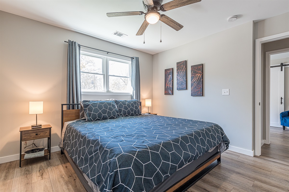 Snooze away on the king master bed