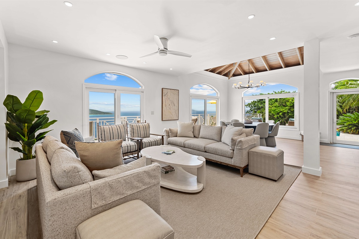 Spacious, ocean-view lounge with vaulted ceilings, Smart TV, board games, and room to unwind. Perfect for lazy mornings or movie nights.