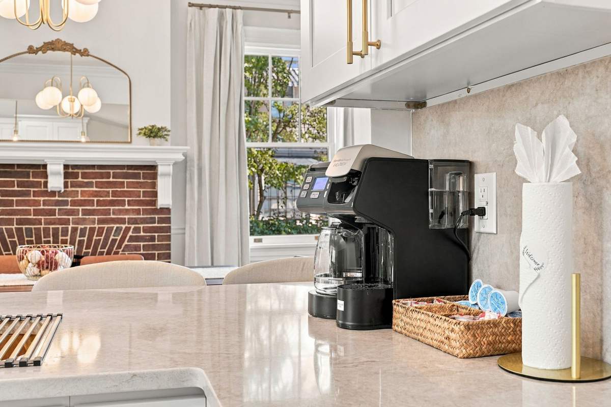 Kitchen Delight: Elegant space with a coffee maker, perfect for brewing morning inspiration!