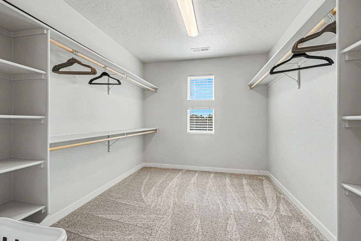 The master bedroom features an incredibly spacious walk-in closet, practically large enough to be a sixth bedroom! Enjoy plenty of room for all your clothing, luggage, and personal belongings.
