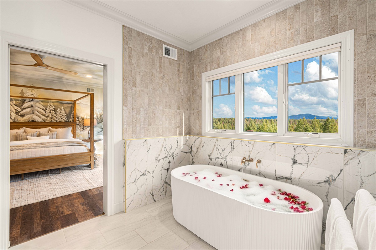 After a long day, you can look forward to prepping a bath in this luxurious master suite.