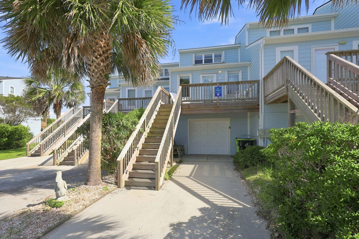 Enjoy the sunshine and palm trees right outside your door in this tranquil coastal community.