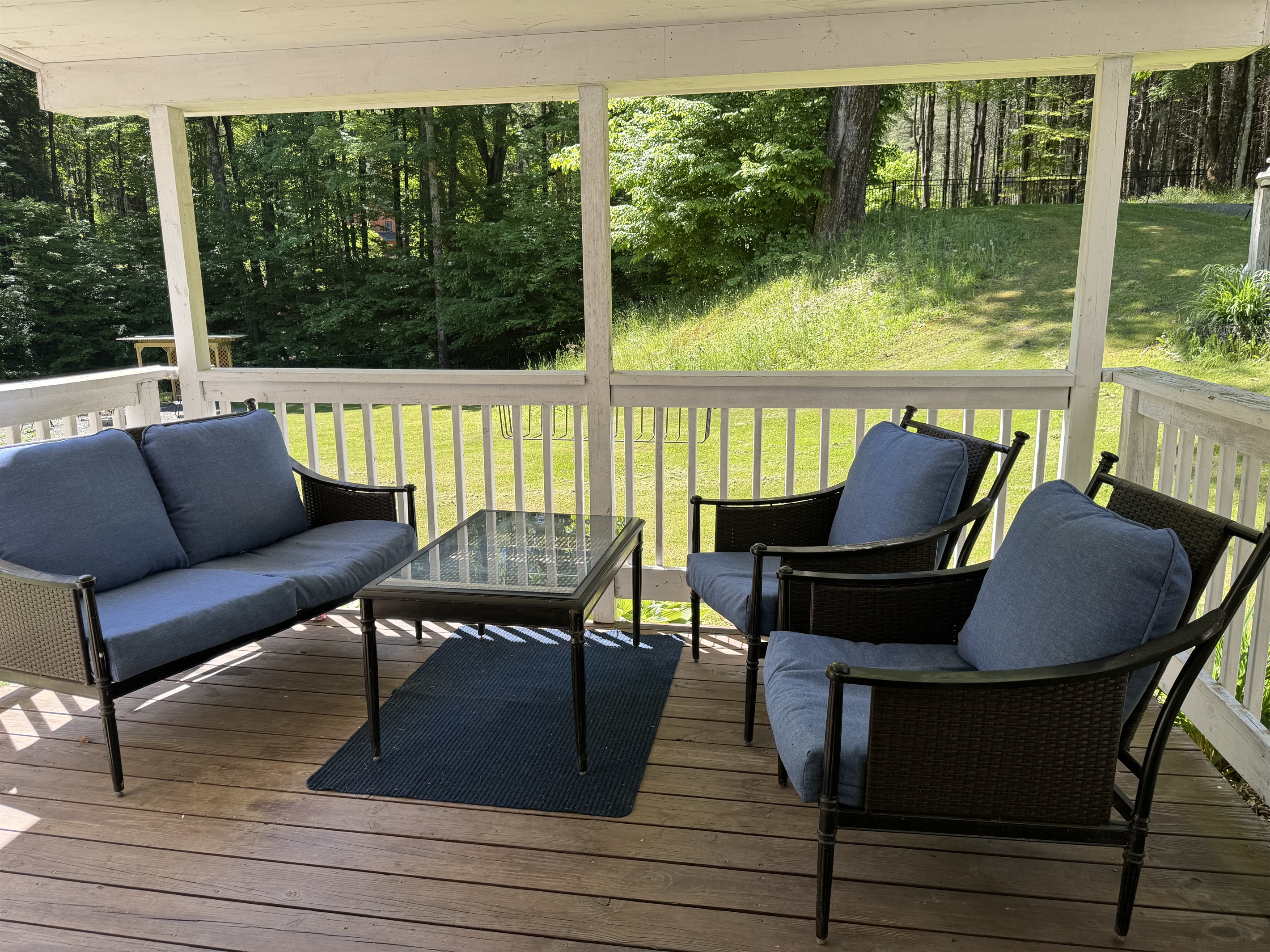 Covered front porch off kitchen