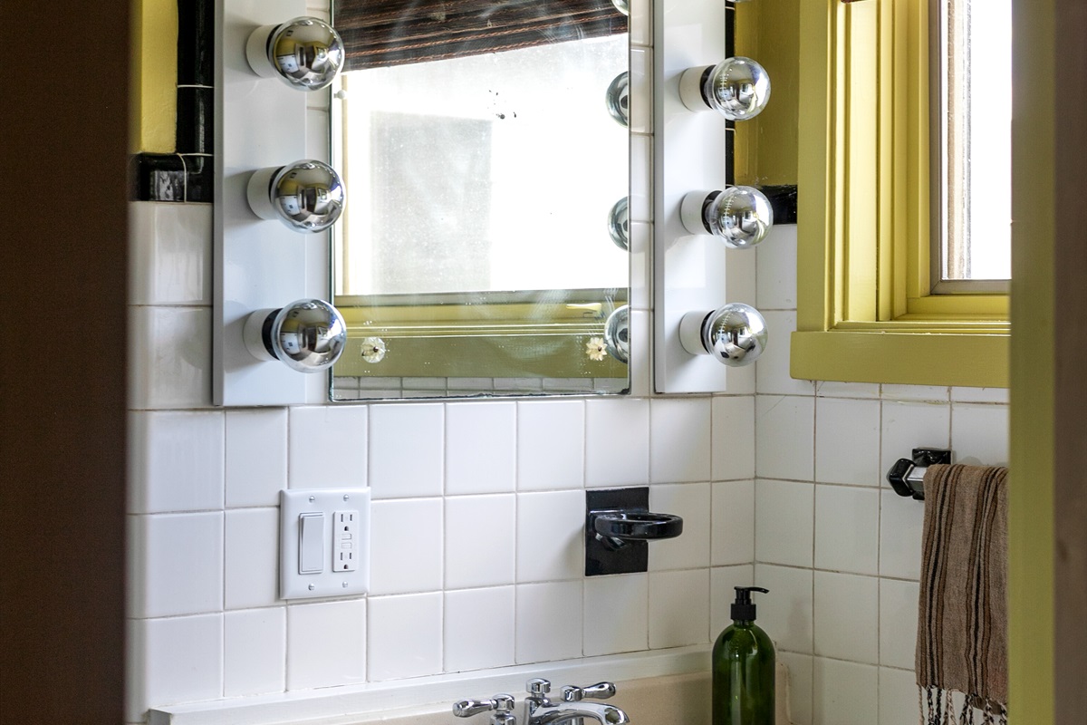 The stand-up shower offers a fresh, convenient start to the day, while the thoughtful design and private setting create a retreat that feels both stylish and relaxing.