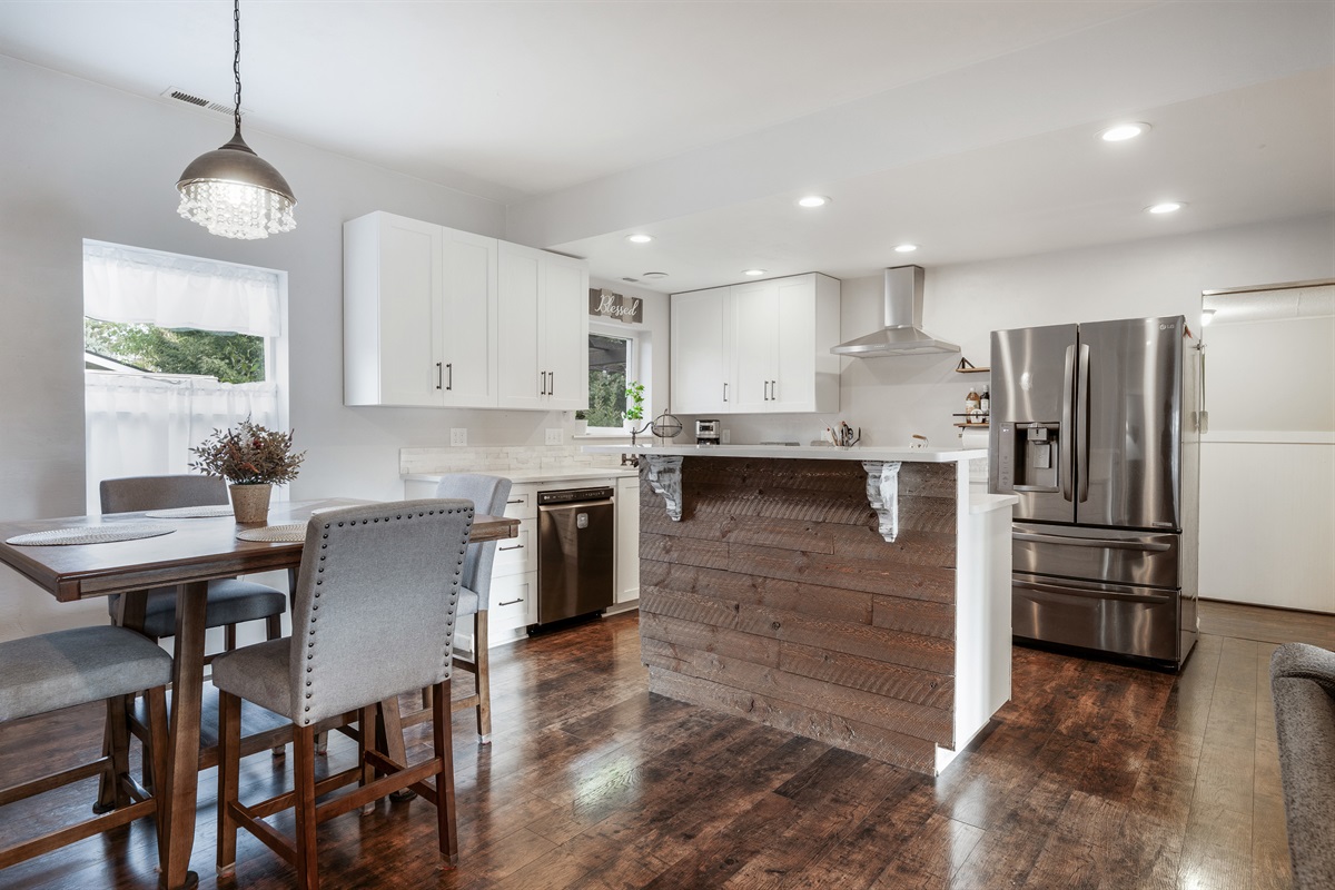 Open kitchen with a marble island