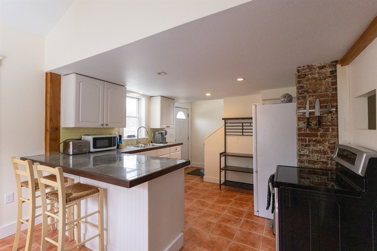 Wider view of the kitchen