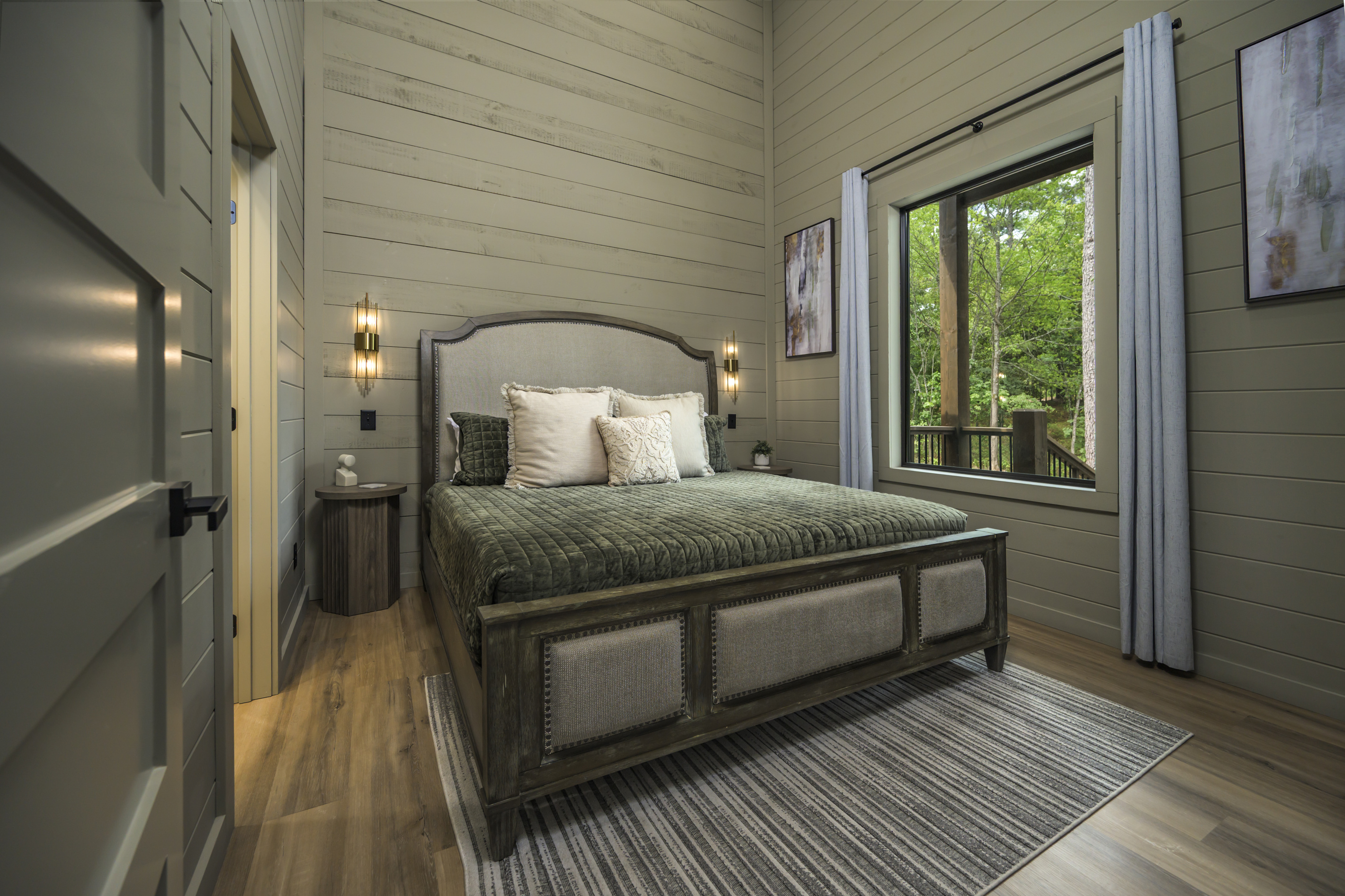Serene Bedroom Retreat: Enjoy lavish comfort with stunning views and elegant decor!