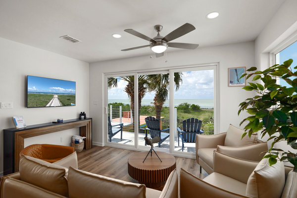 Upstairs Great Room with Bay and Island Views
Comfy seating for 5 and Dining for 6
Steps out to the Balcony