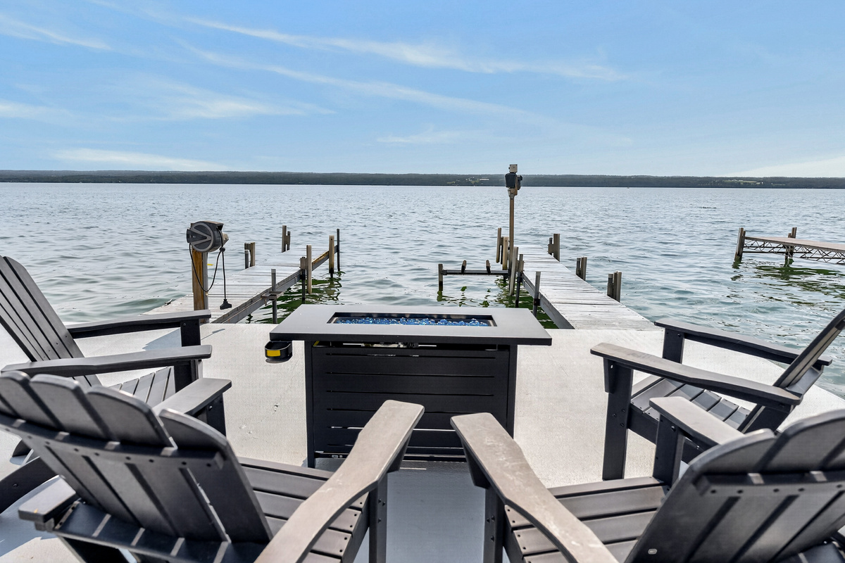 Adirondack seating facing the water