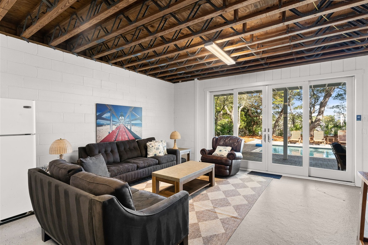 The ultimate chill zone! Our lower-level lounge offers the perfect view of the pool and easy access to cold drinks.