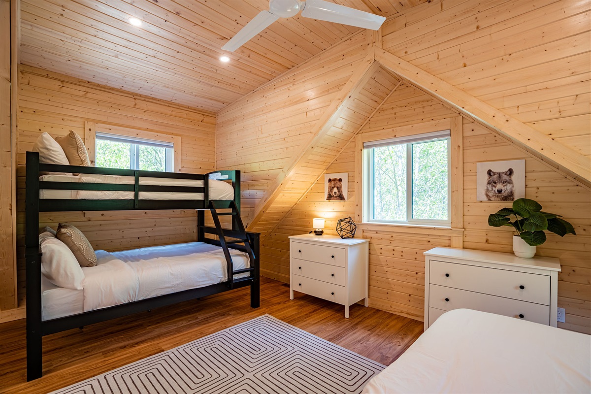 Comfy twin over double bunk bed with Douglas mattresses.