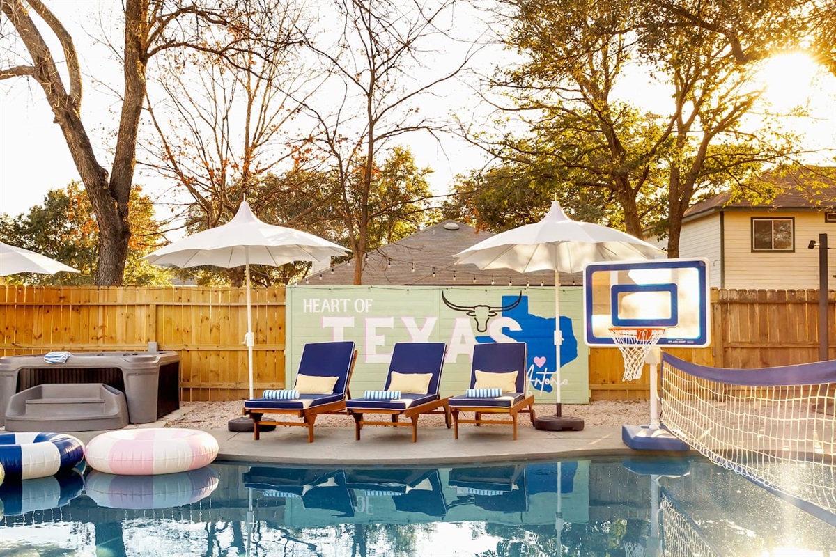 From sunrise coffee to sunset soaks, this relaxing poolside setup with loungers, hot tub, and water games is perfect for creating core memories together.