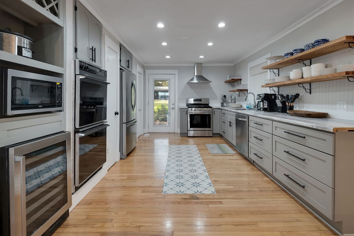 Gas range and oven, double electric oven, microwave, wine storage, icemaker