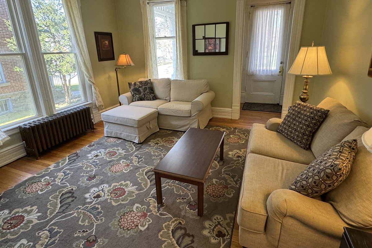 Spacious living room with large windows