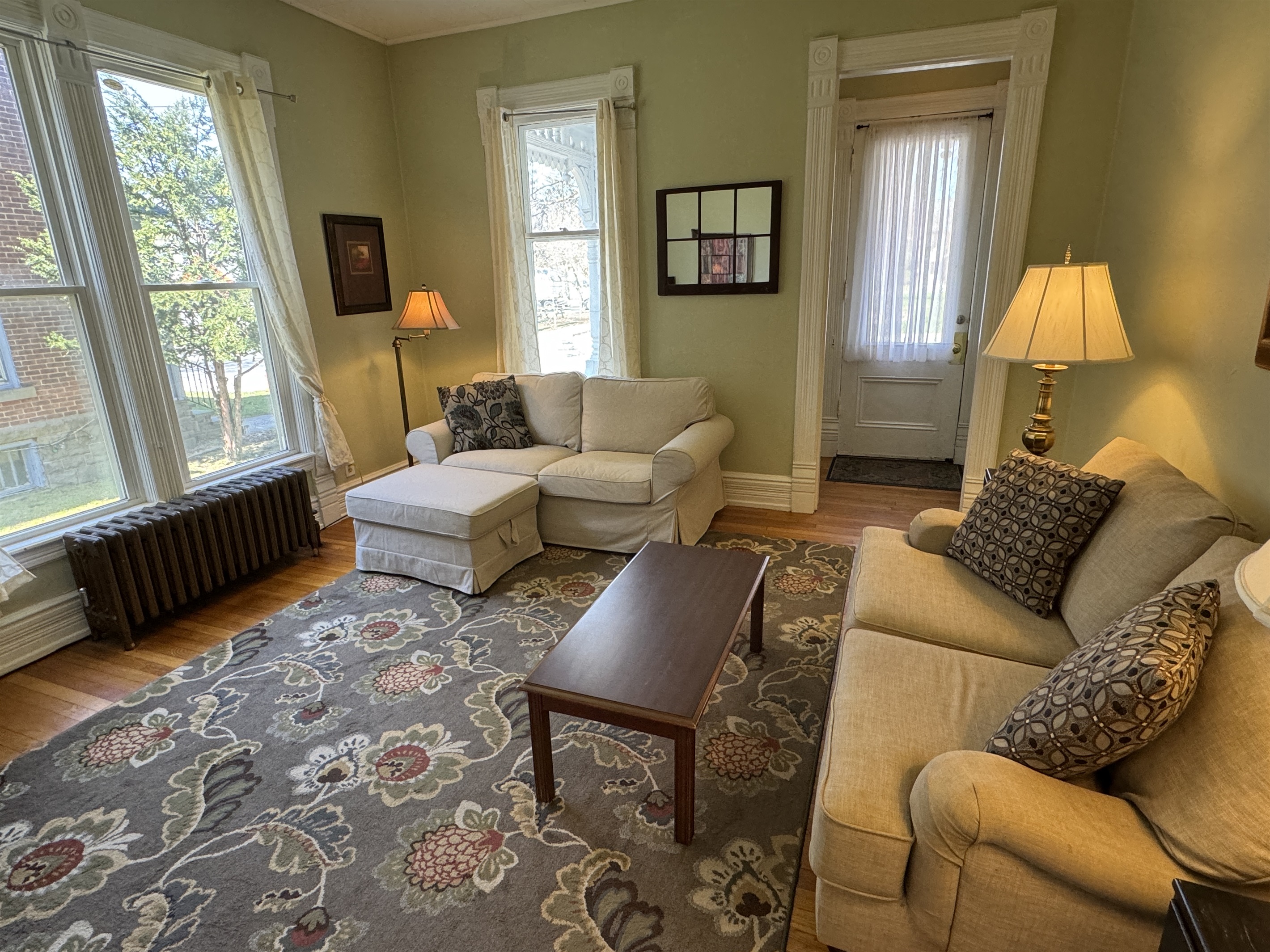 Spacious living room with large windows