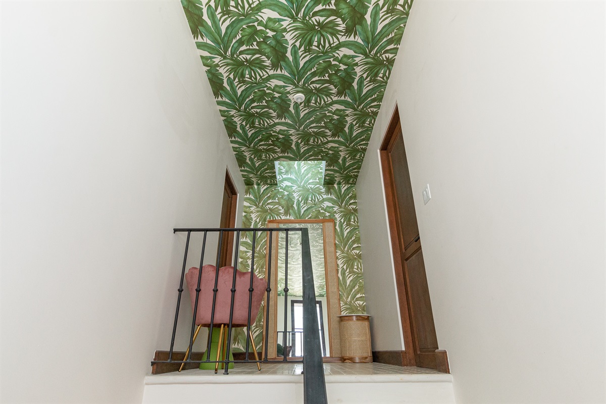 Right wing upstairs foyer with full length mirror and designer touches.