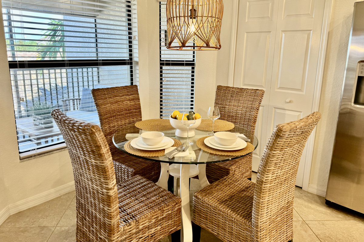 Enjoy a quiet dinner in the dinette area, featuring comfortable seating and picturesque views of the surrounding scenery.