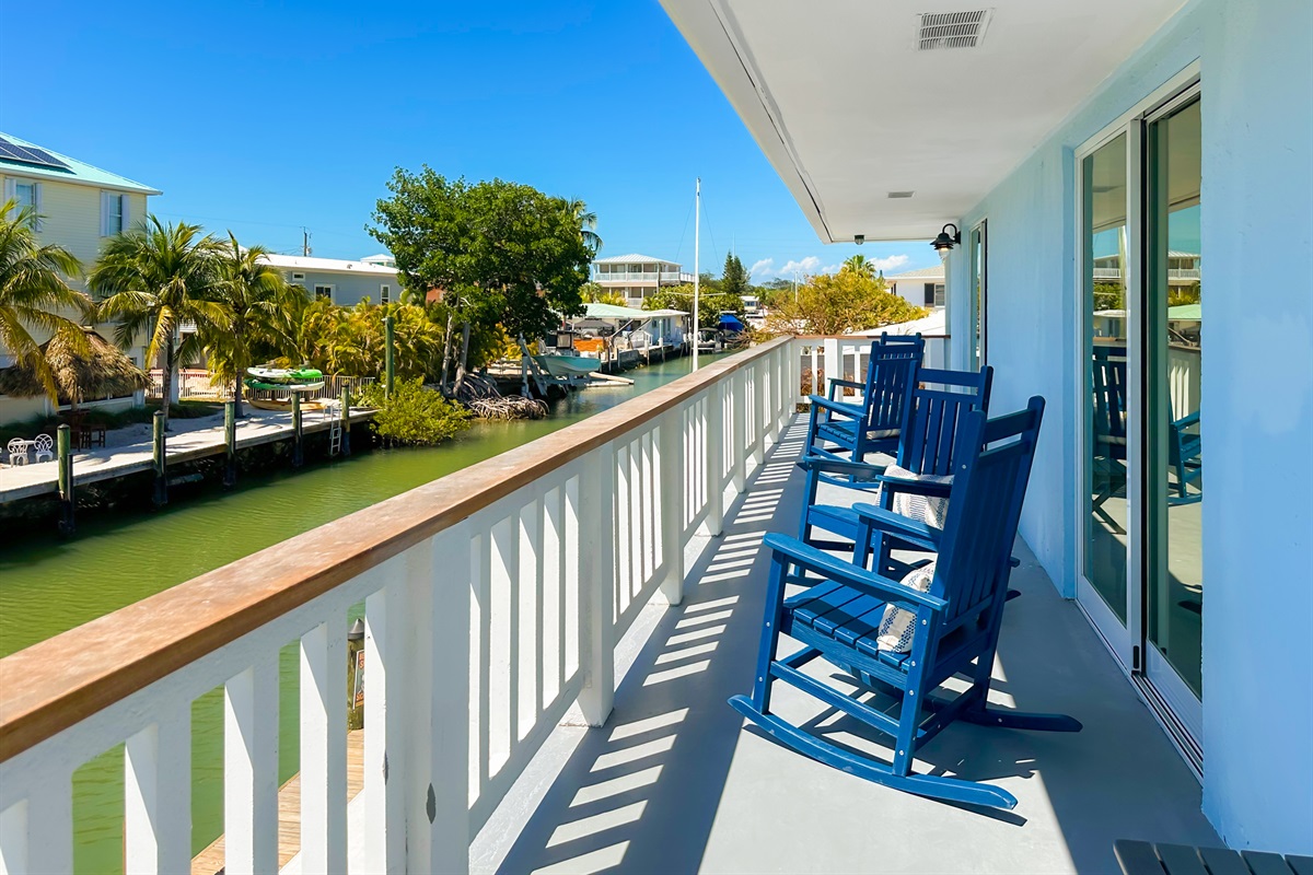 Relax while catching the breeze and watching people on the canal.