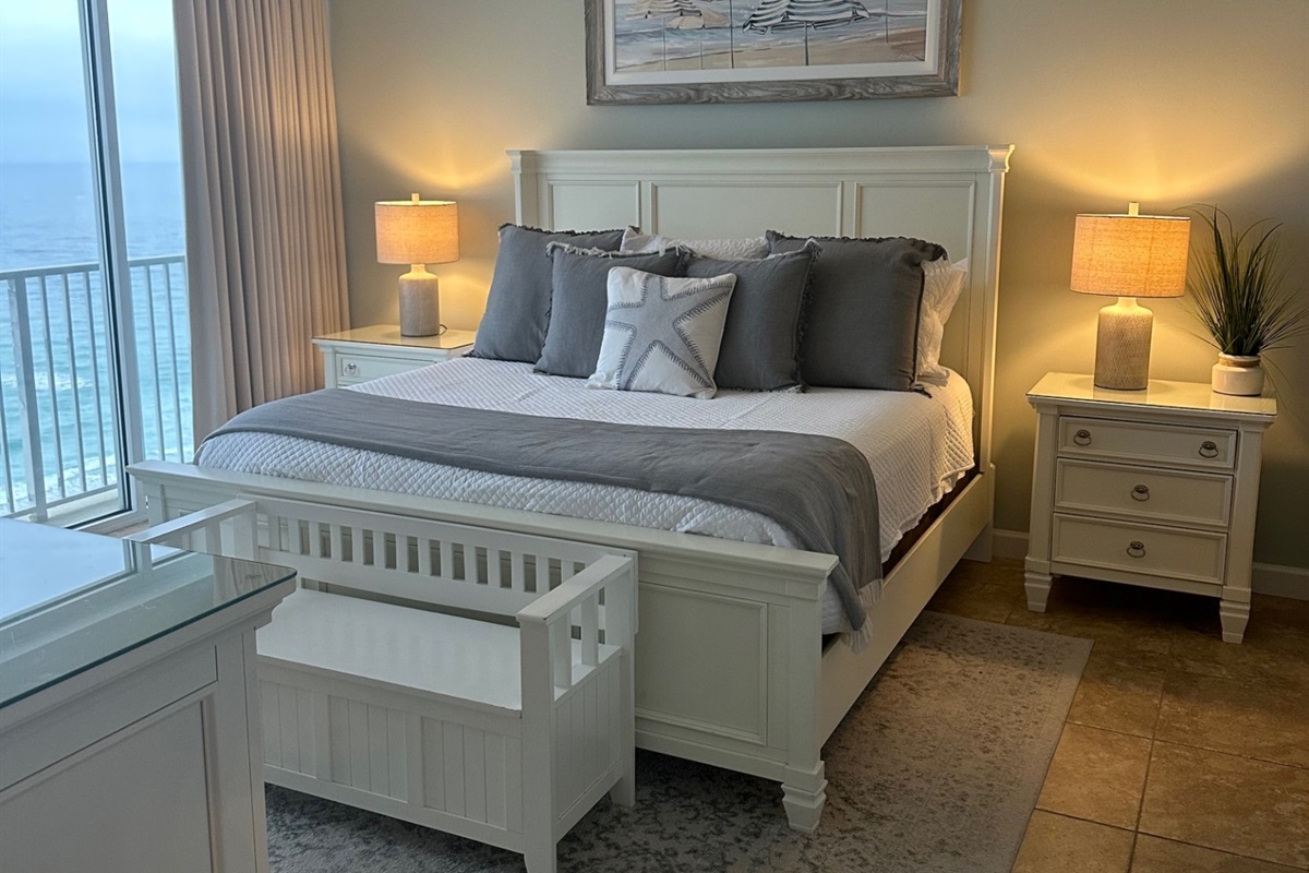 Master bedroom with king bed and beach view