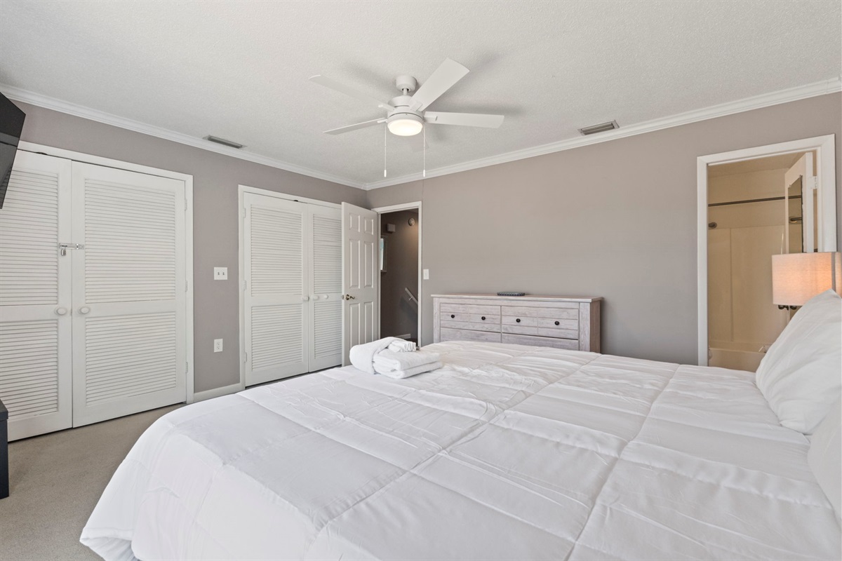 Primary Bedroom with King Bed, Smart TV & Ensuite Bathroom and Balcony