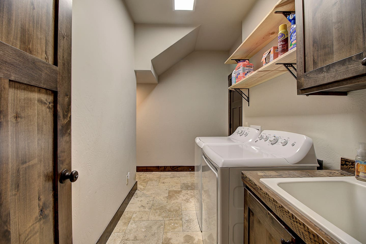Full-size washer and dryer with everything you need on hand, this laundry space makes it easy to stay fresh for every adventure.
