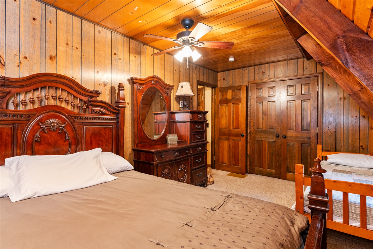 Bedroom #3 Cozy cabin-style bedroom with queen and twin and direct access to the hallway for added convenience.