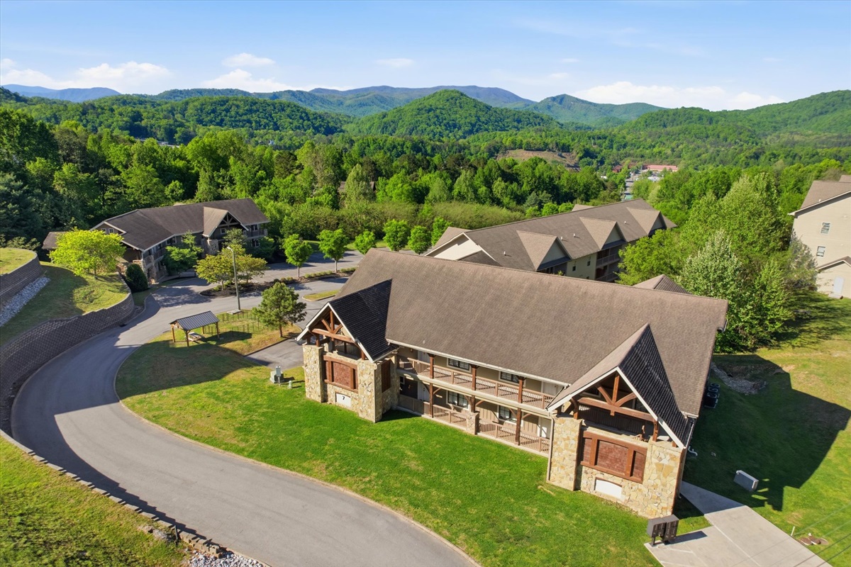 Take in the full view of Hearthstone Lodge, where the scale of the building hints at the spacious, group-friendly stays waiting inside, all set within the peaceful surroundings of Serenity Ridge Resort.
