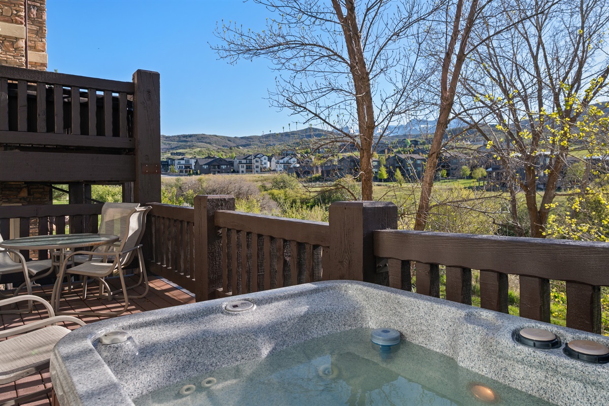 Relax in the private hot tub while taking in peaceful views of Ogden Valley.
