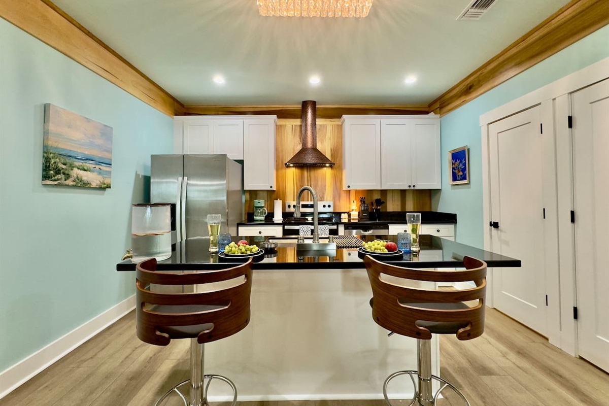 Prepare meals with ease in this bright, modern kitchen.