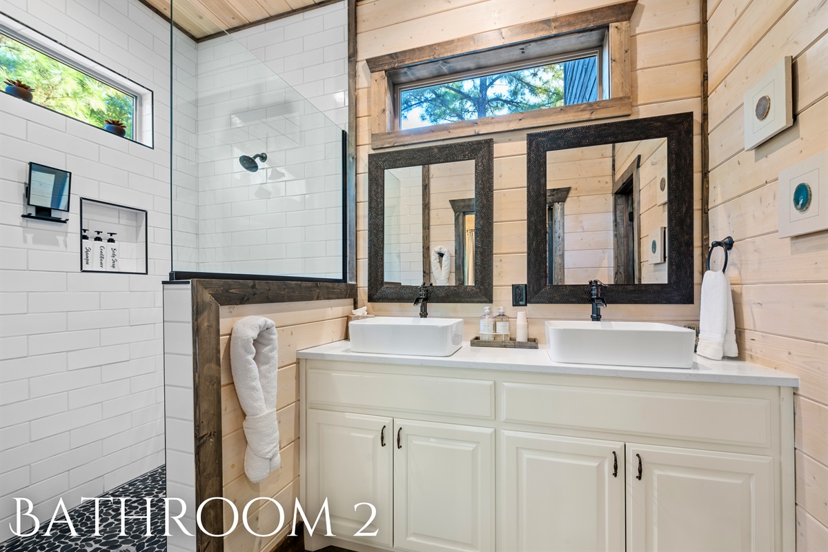 A clean, modern bathroom with all the essentials and thoughtful details for a comfortable stay.