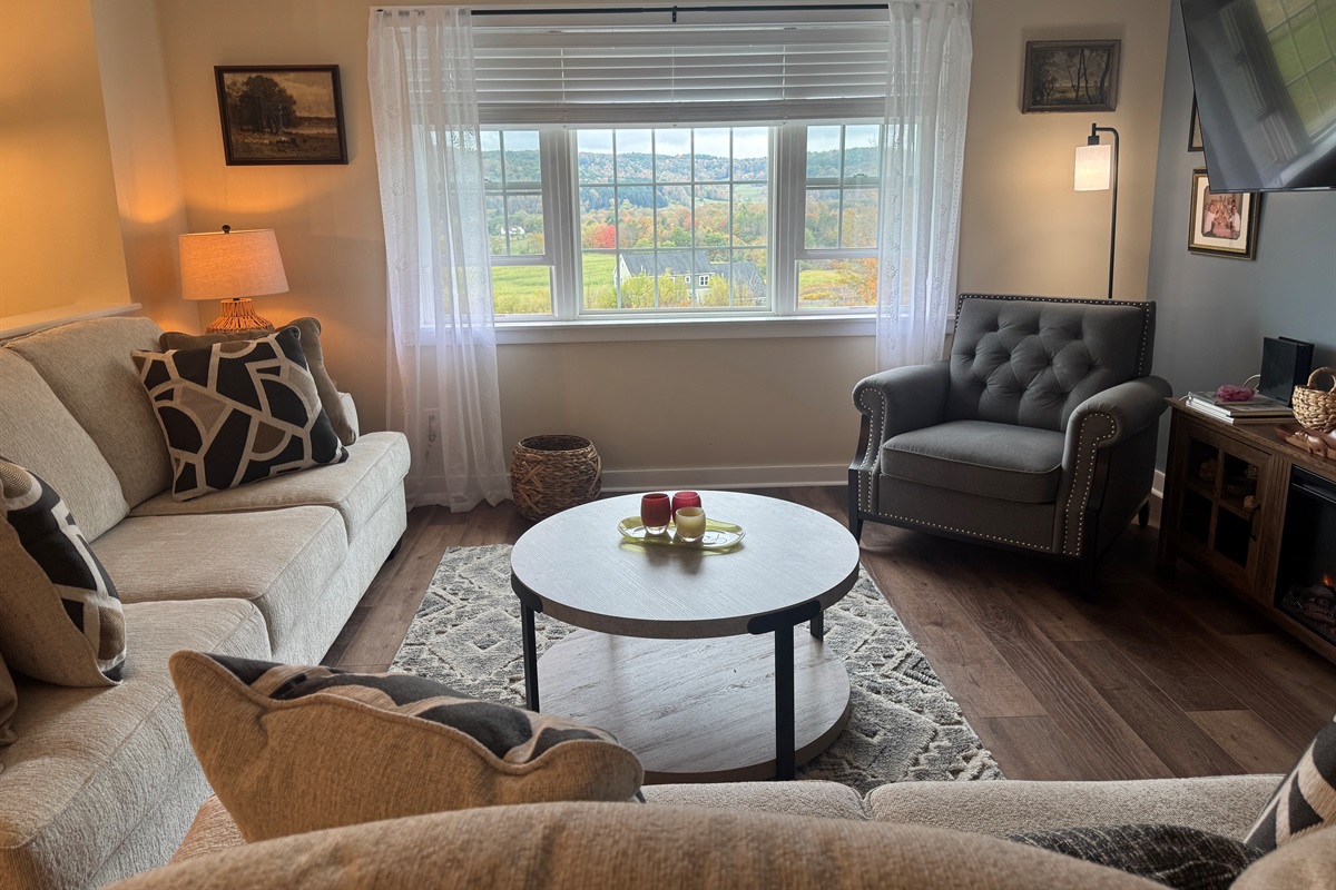 Comfy living room with large SmartTV