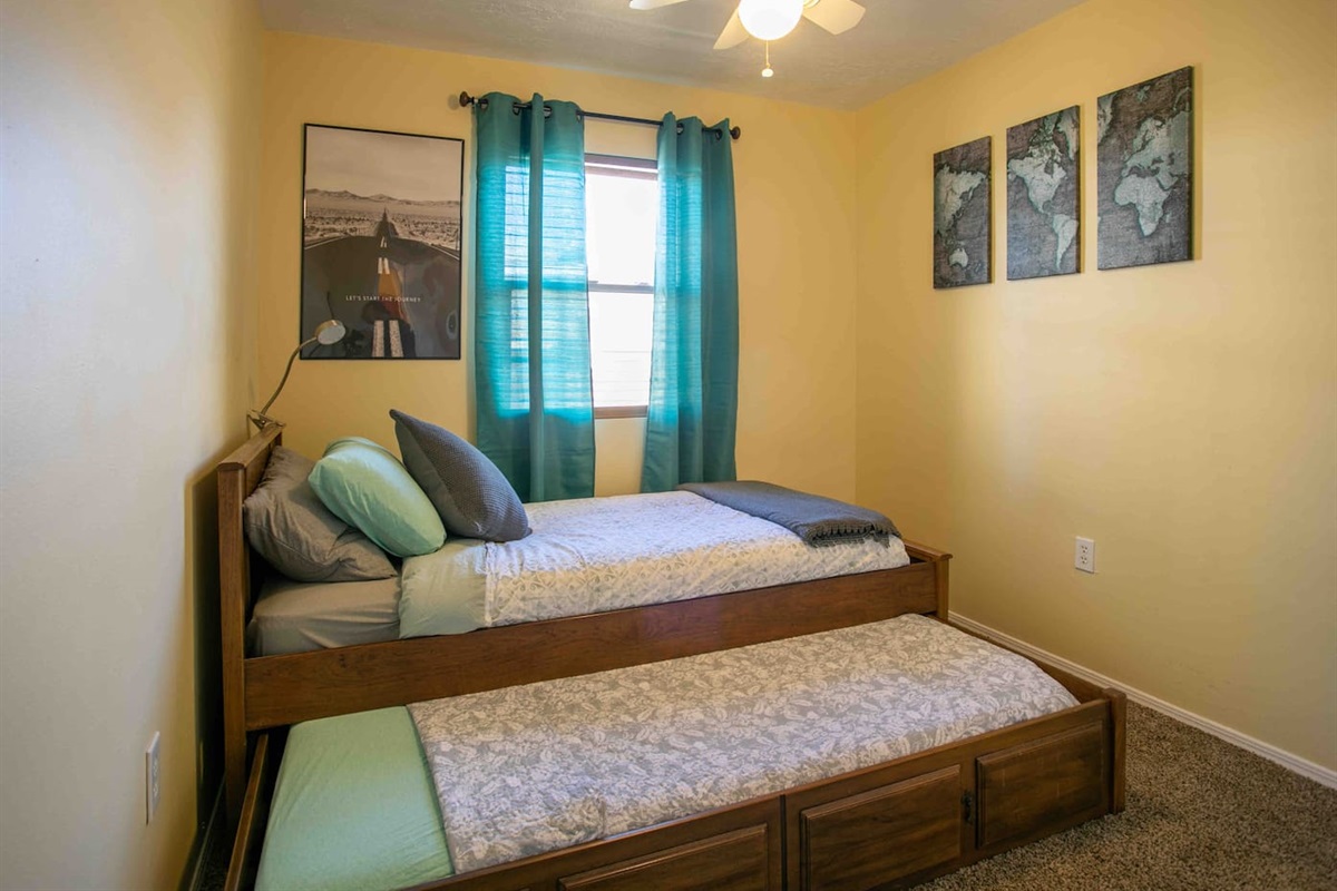 Currently this trundle bed is not available and has been replaced with a queen bed. Updated photos coming soon. 