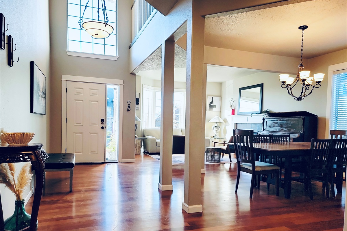 View of dining room 1, living room 1, entryway