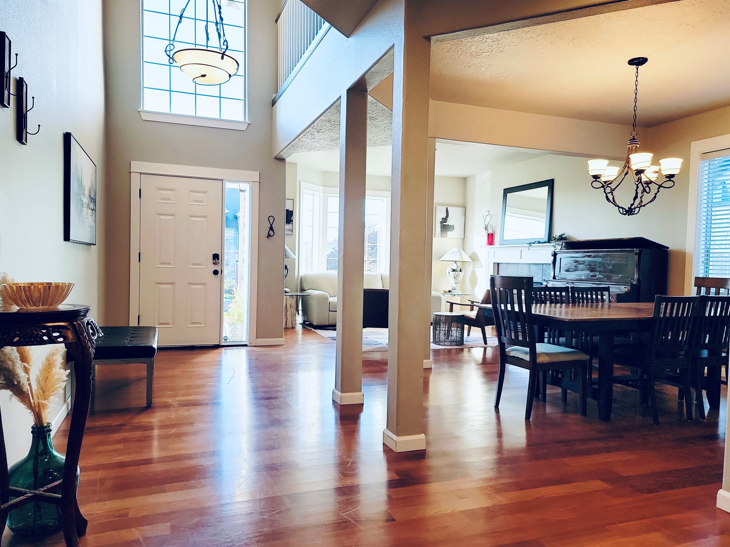 View of dining room 1, living room 1, entryway