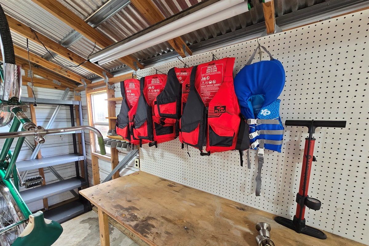 4 adult and 1 child life vests