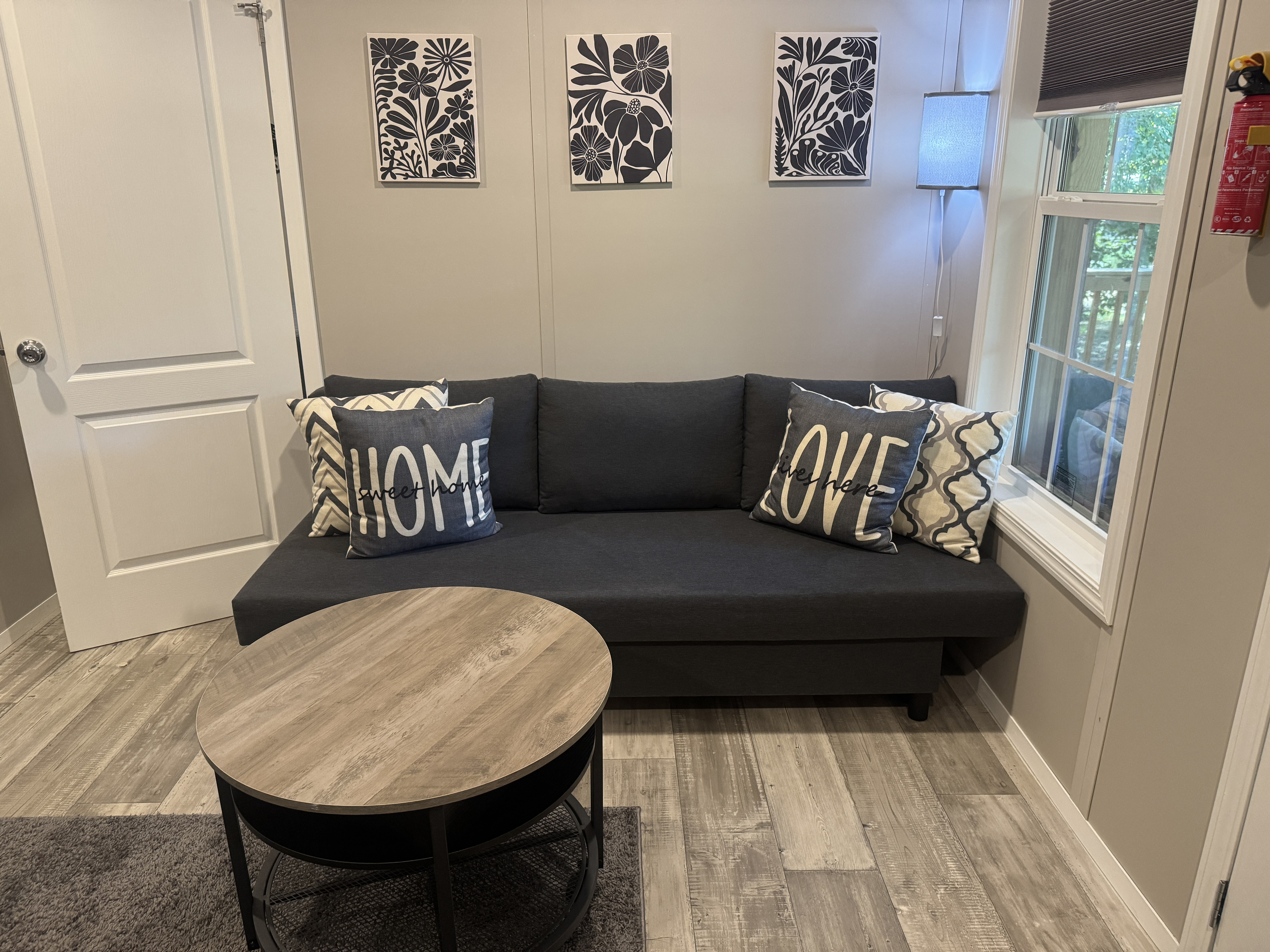 Living room with sleeper sofa, perfect for relaxing or extra guests