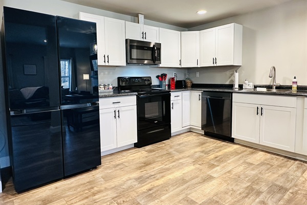 Plenty of refrigerator and counter space. Full size oven, microwave, dishwasher, and garbage disposal.