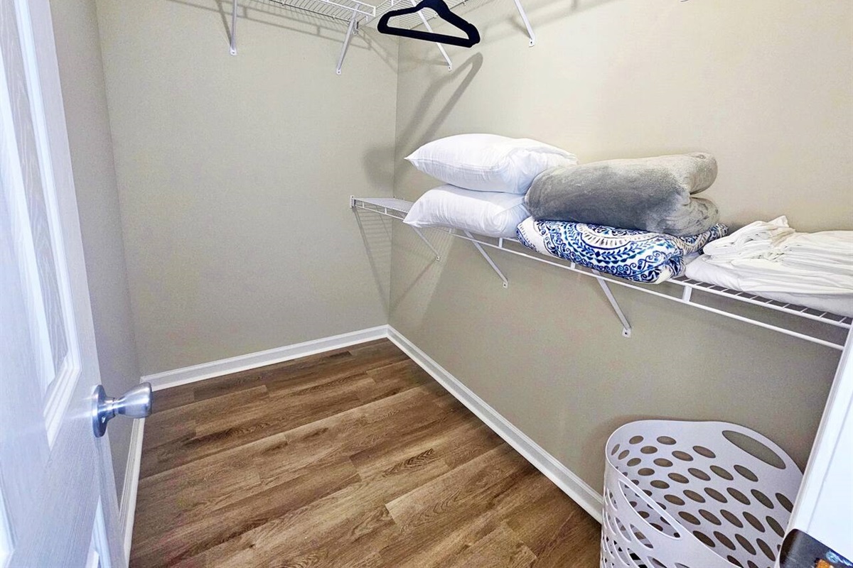 This walk-in closet is located in the main room. There is plenty of space for storage. You will find extra blankets, pillows, and linen here. Velvet hangers included. 