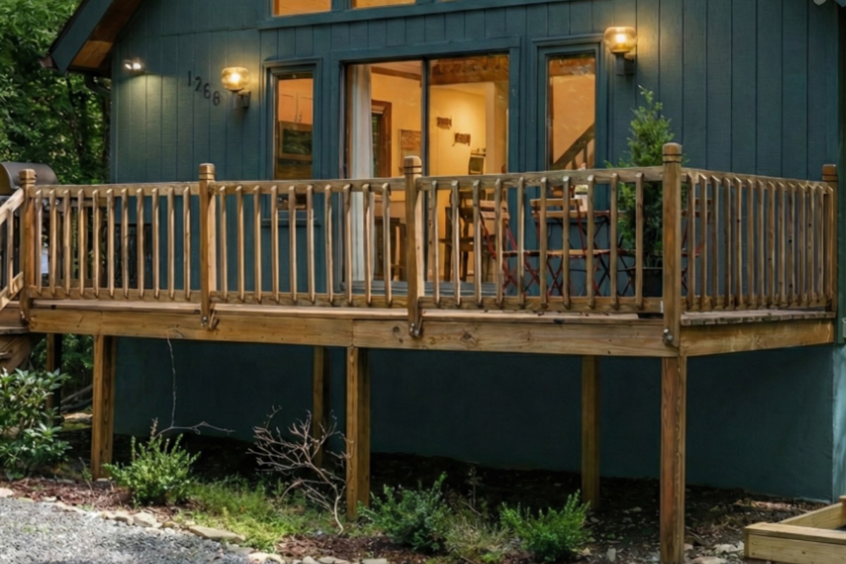 You are almost guaranteed to see plenty of deer walking by while sitting up high on this deck overlooking your hot tub, firepit, sandpit and yard