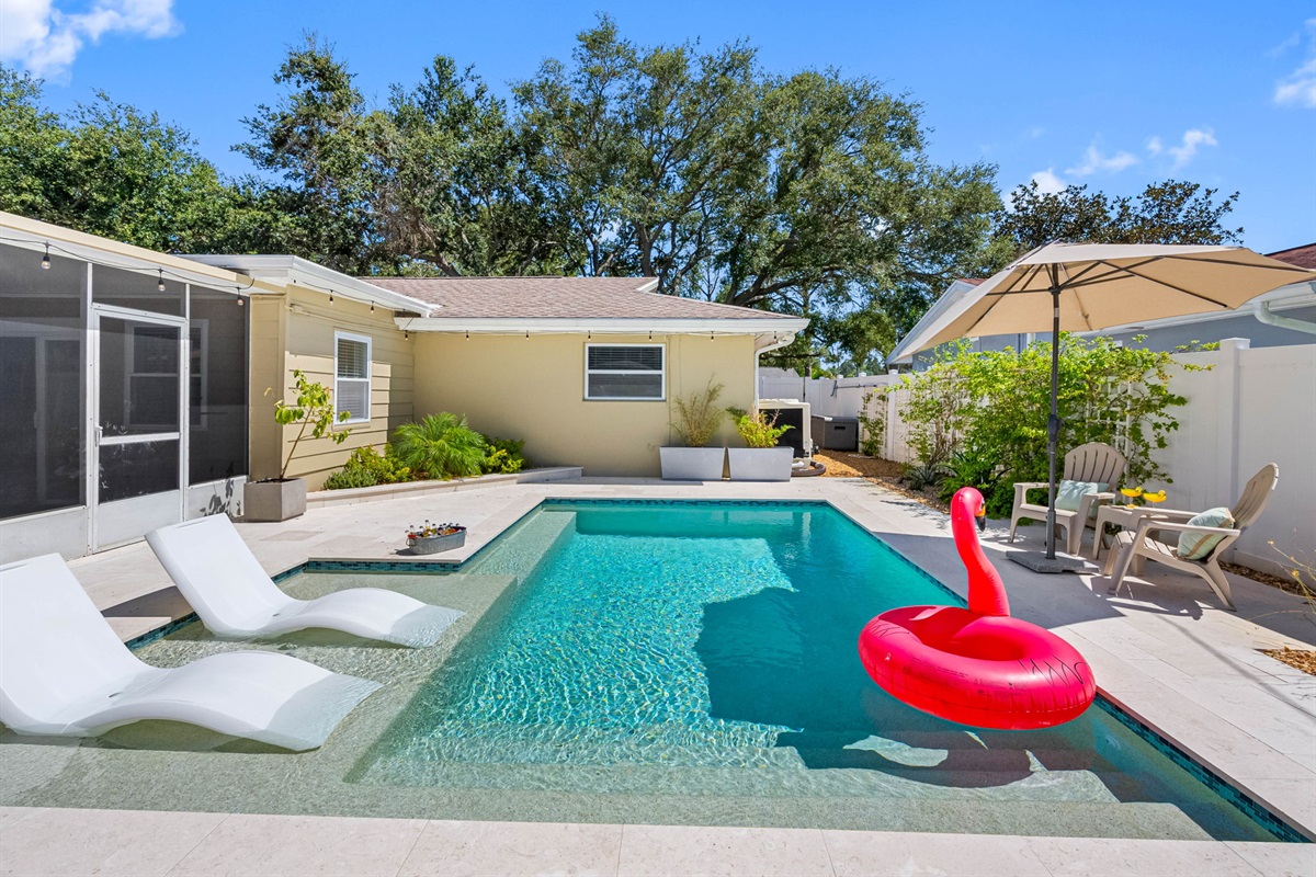 Whether you’re cooling off in the water or dining beneath the fan, this space is designed for maximum comfort.