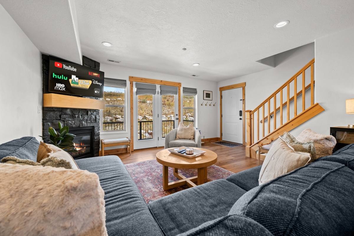 Kick back in the comfortable living area with plenty of seating for movie nights and quiet mornings.