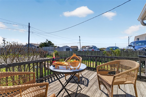 A peaceful front porch made for slow mornings and golden-hour evenings.