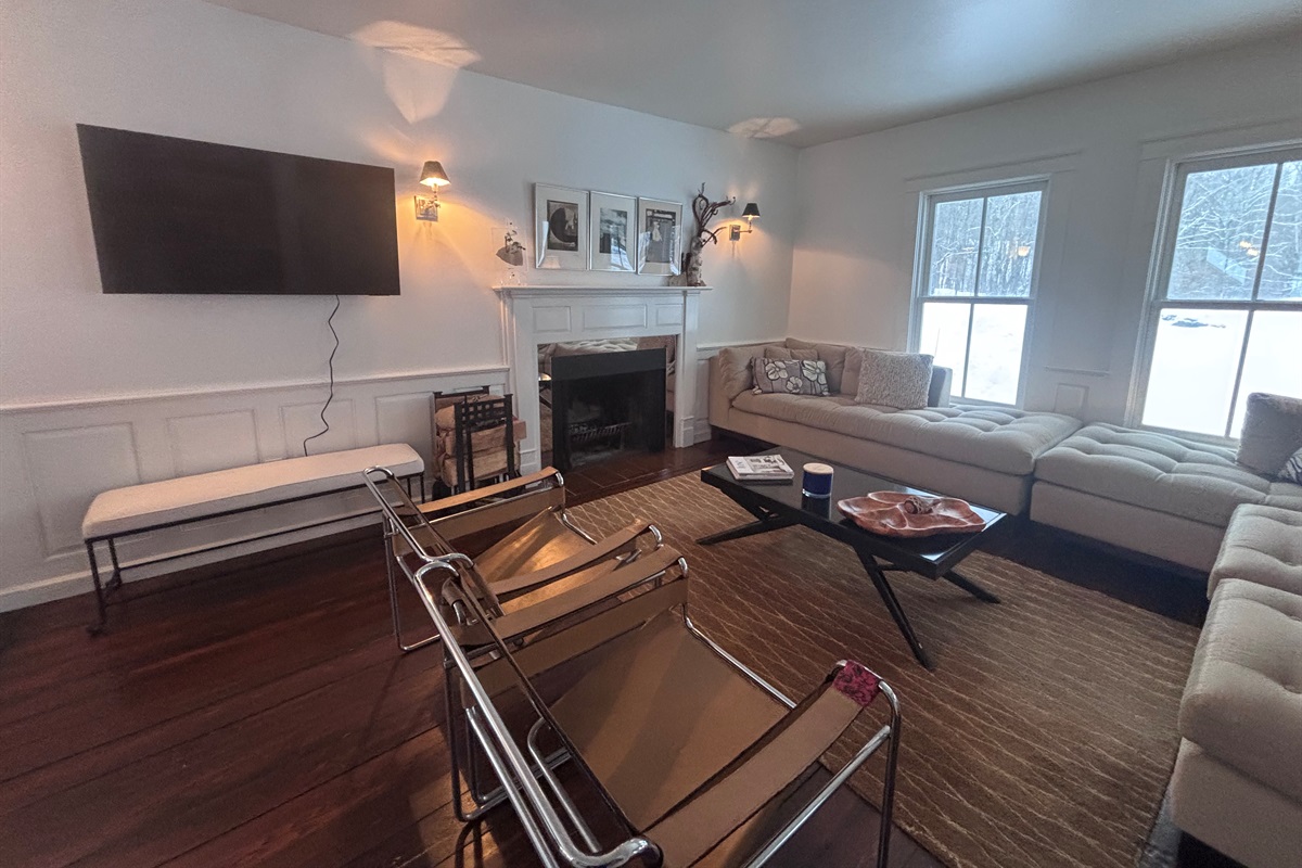 Cozy Living Room

“Comfortable living room with fireplace, seating for gathering, and space to relax after a day outdoors.”