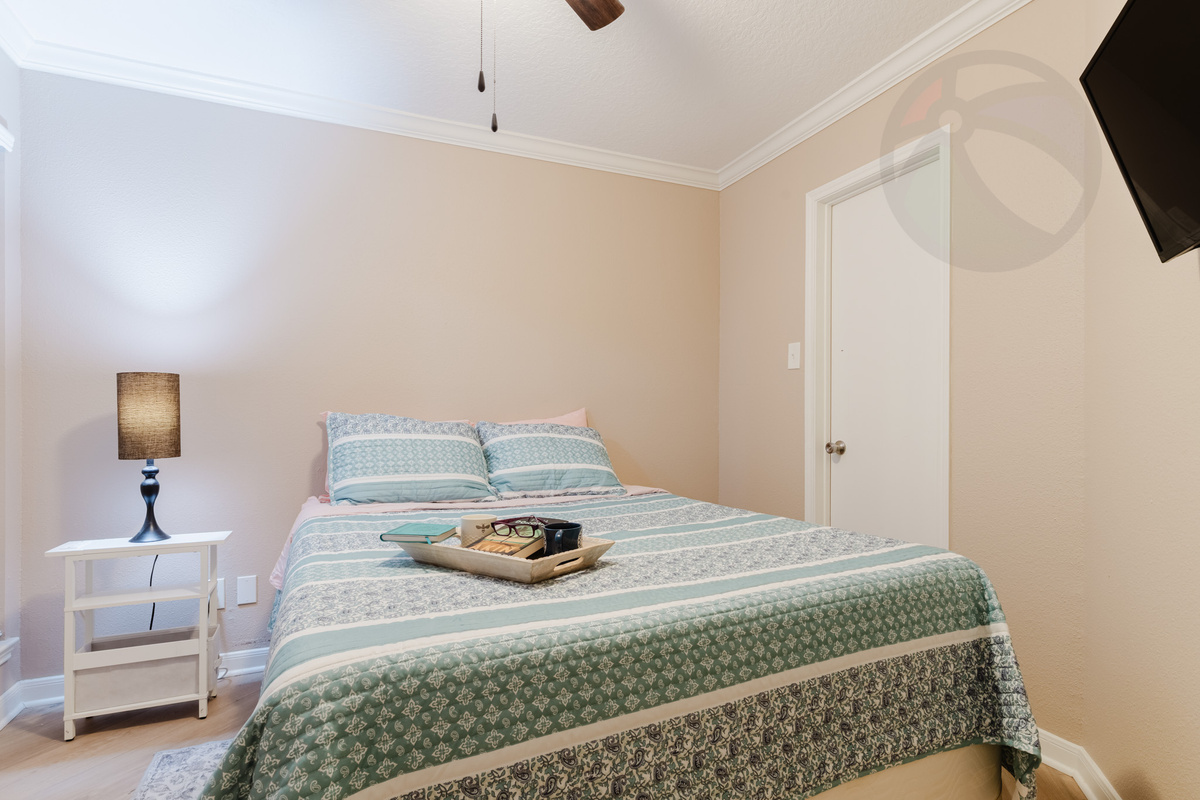 Wind down in the comfy queen bedroom