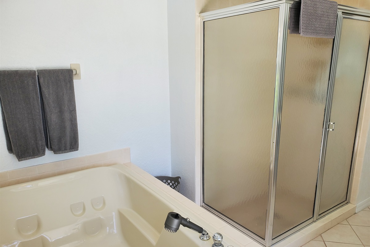 King bathroom with jet tub and walk in shower
