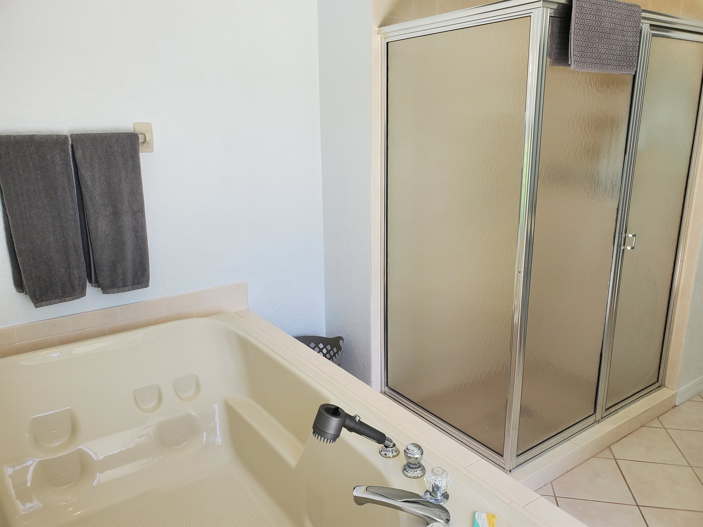 King bathroom with jet tub and walk in shower